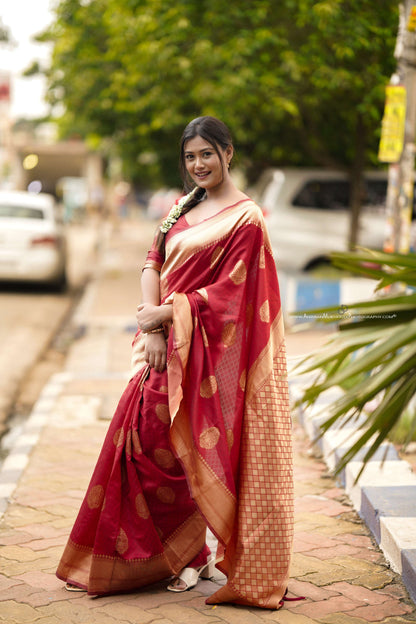 Maroon Soft Banarasi silk saree with all over the saree & zari weaving Rich pallu